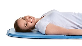 Application of Biomag magnetic therapy using A12PL applicator for head and back therapy. Ideal for applying therapy in the comfort of your own home.